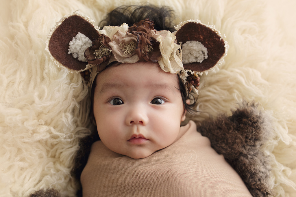 Emelia is one of the cutest 4 months old I've photographed in this little bear headband.