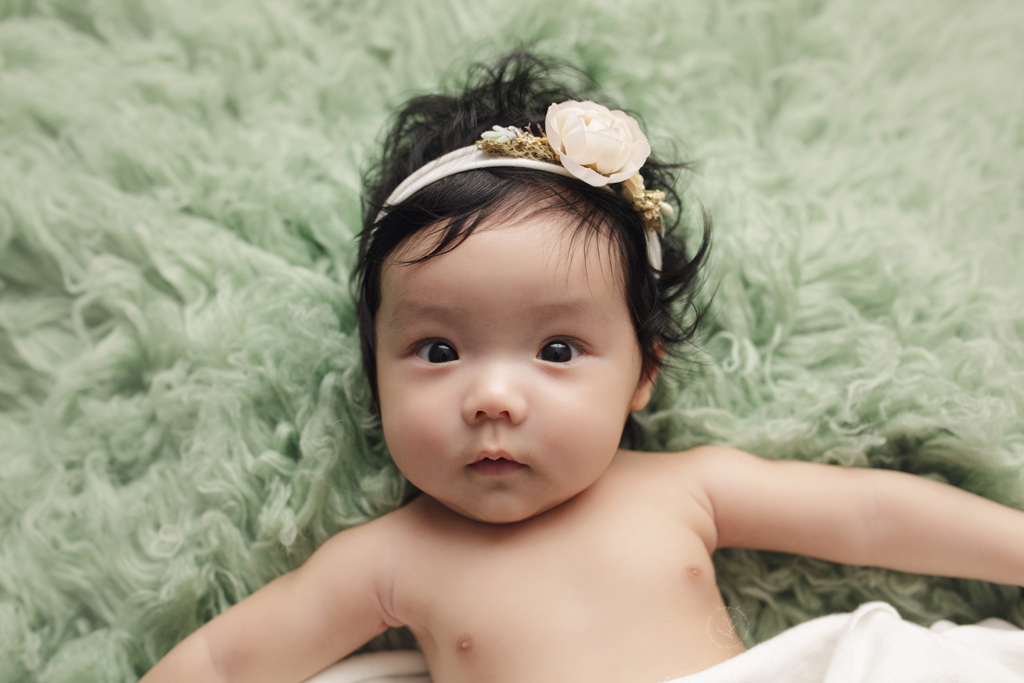 The best baby pictures taken in Waukesha County, Wisconsin. This adorable baby girl has the most beautiful skin.