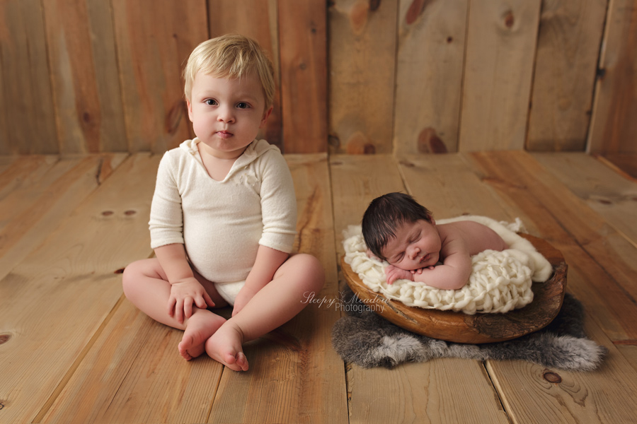 Newborn baby in hand carved bowl by Sleepy Meadow Photography | Milwaukee's Best Newborn Photographer