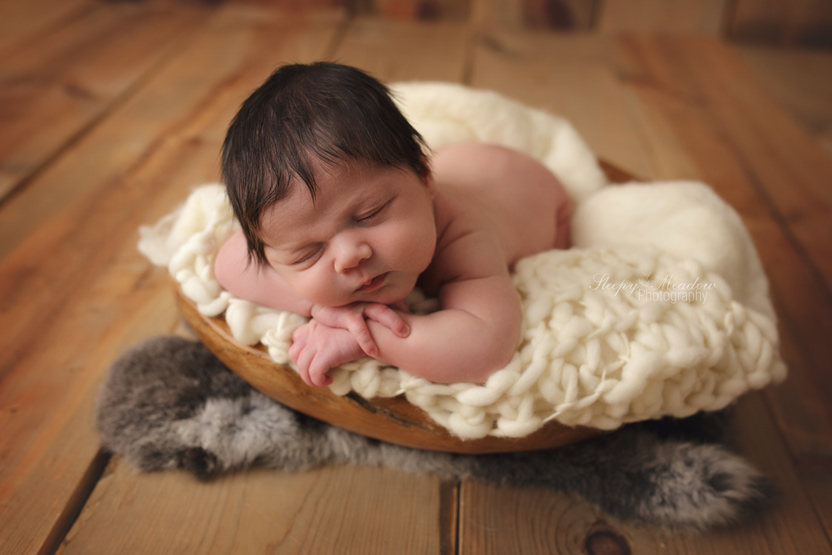 Look at baby Franklin posing with a head full of hair for his newborn session on this beautiful wood backdrop at Sleepy Meadow Photography. Who would've known we had such cute babies in Oconomowoc.