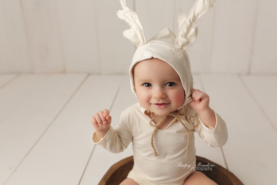 This little cutie was photographed wearing a moose outfit, which was inspired by his dad who is a hunter.