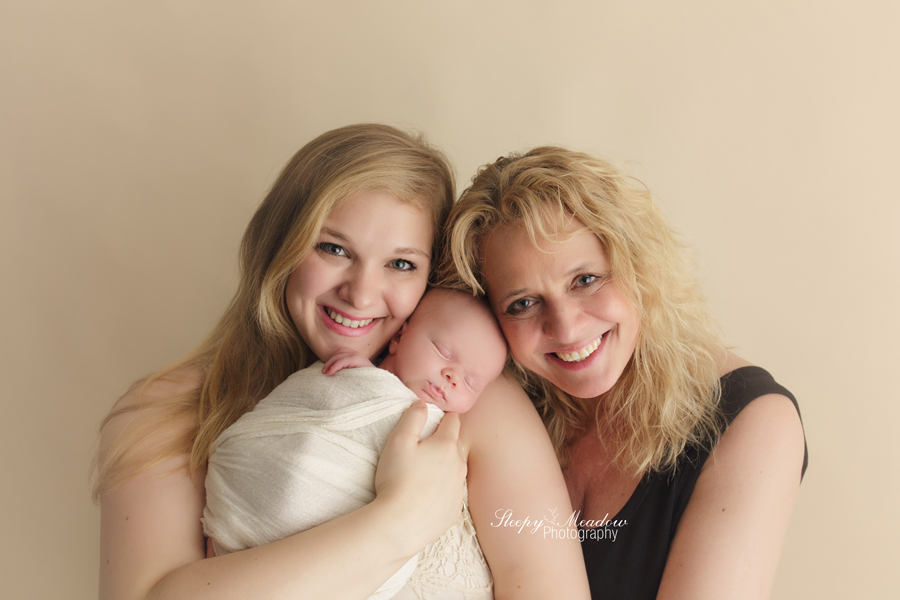 Professional family photo from baby's newborn session in Milwaukee by Sleepy Meadow Photography
