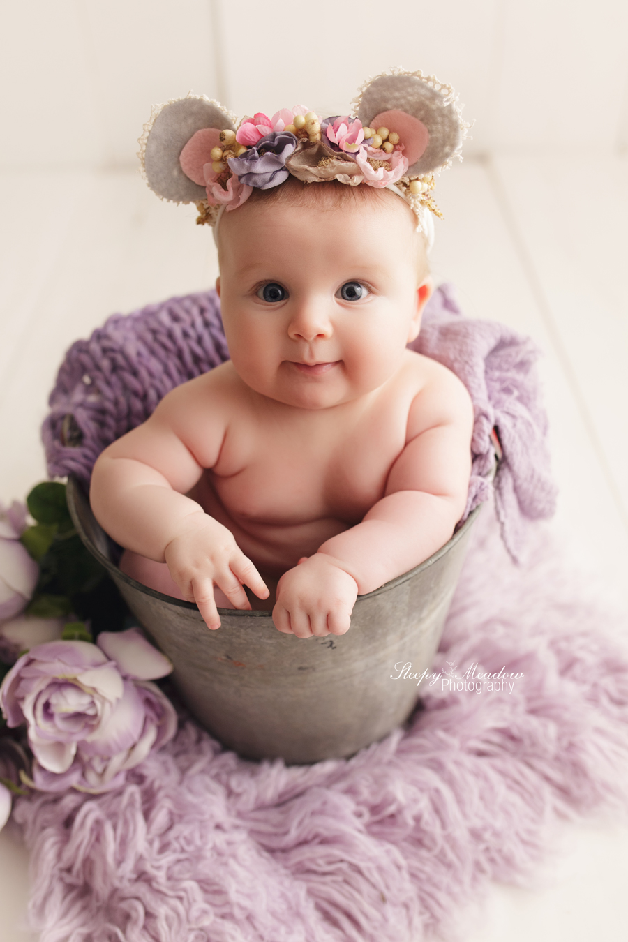 Baby poses in vintage bucket wearing an adorable mouse headband by the Dainty Miss. Pictures by Sleepy Meadow Photography of Milwaukee.