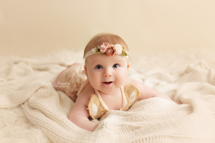Adorable 4 month old pictures on neutral setup at Milwaukee portrait studio by Sleepy Meadow Photography.