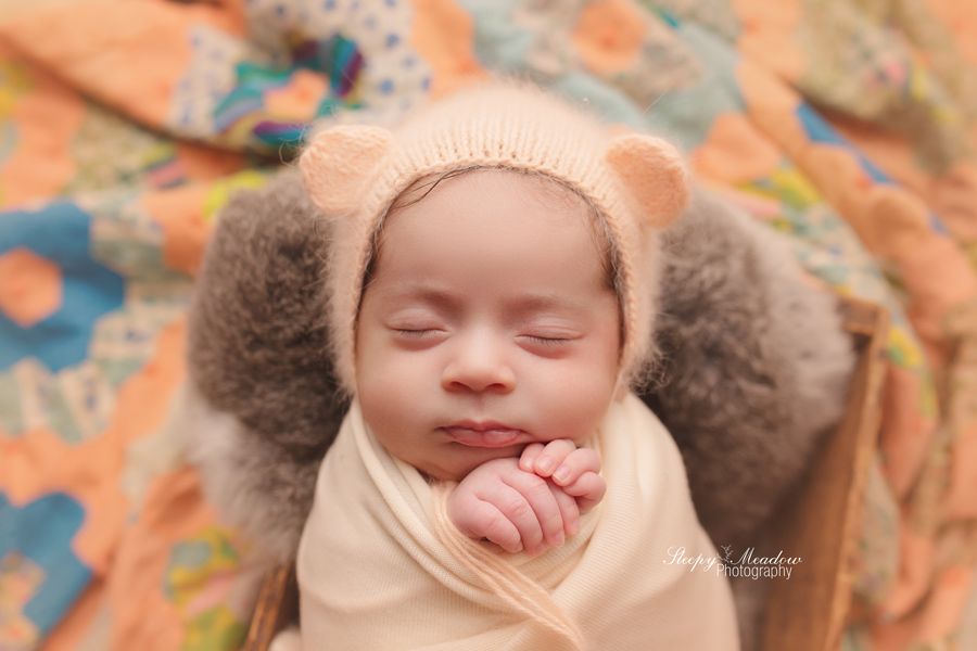NEWBORN GIRL WEARING BEAR BONNET | BY SLEEPY MEADOW PHOTOGRAPHY OF WAUKESHA