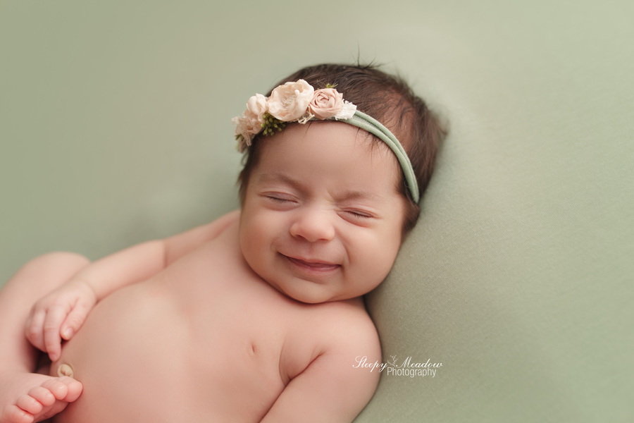 BABY SMILES DURING NEWBORN SESSION WITH SLEEPY MEADOW PHOTOGRAPHY | WAUKESHA NEWBORN PHOTOGRAPHER
