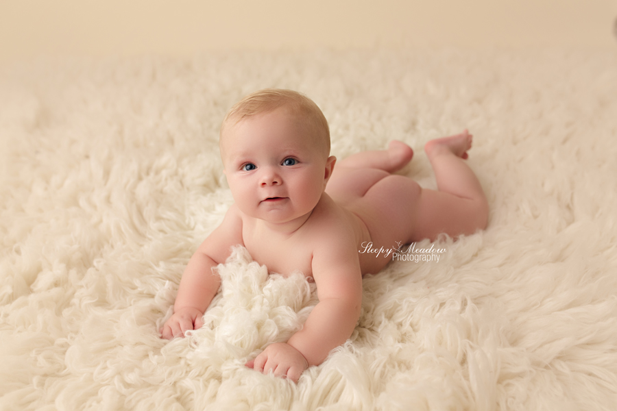 Beautiful Baby Boy 6 month old poses in his diaper on white Stock Photo -  Alamy