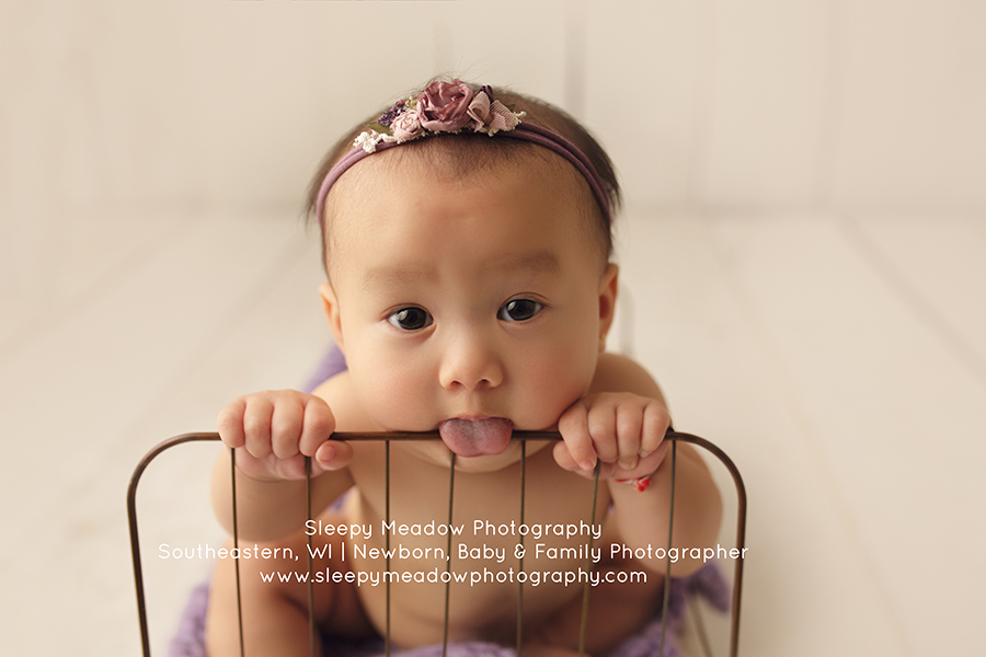 Baby sticks her tongue out | Sleepy Meadow Photography