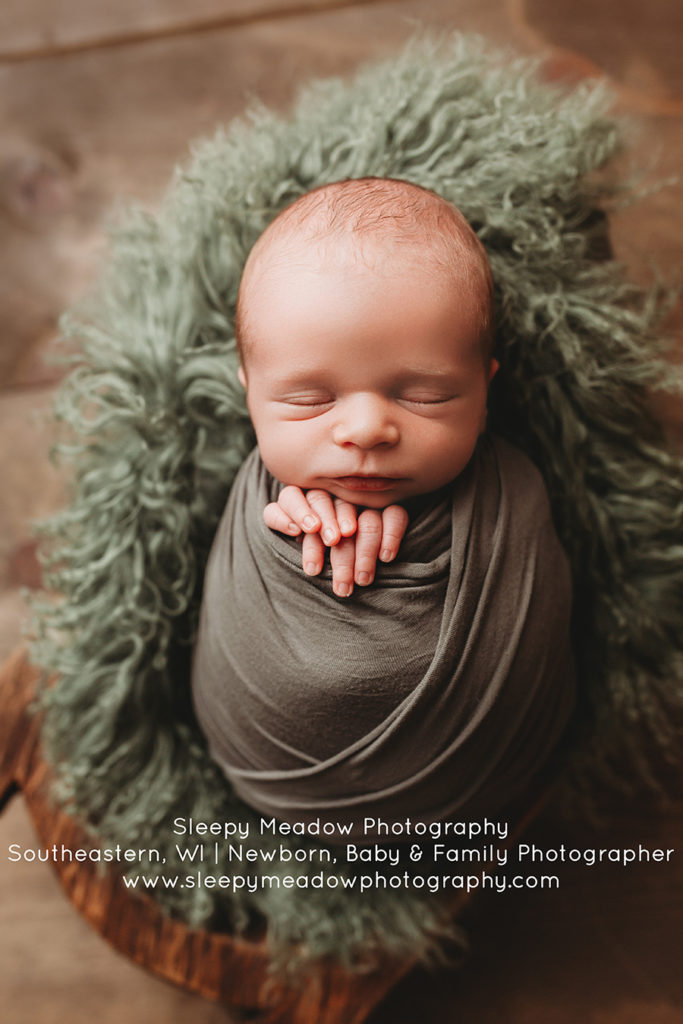 The first days go by fast. Be sure to document your fresh new baby with newborn portraits by Sleepy Meadow Photography of Brookfield.