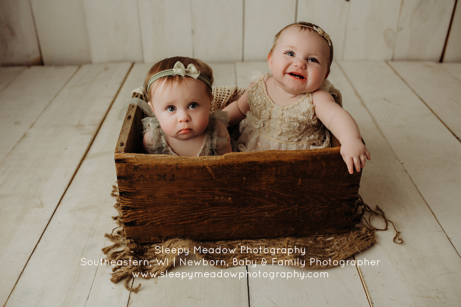 Twin girl babies in a box by Sleepy Meadow Photography | Brookfield WI